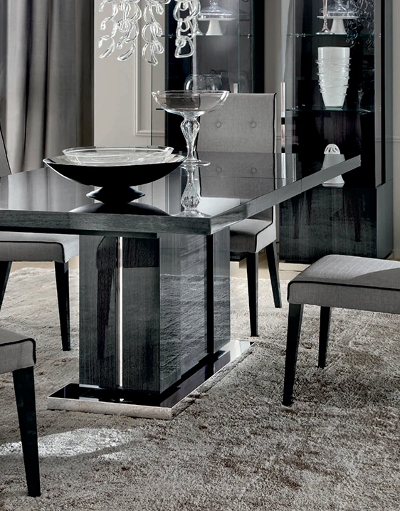 dark grey rectangular table with 4 chairs