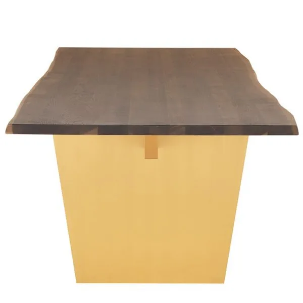 Aiden dining table shown from long side where you can see the line of the Oak top and brushed gold base by Nuevo Living