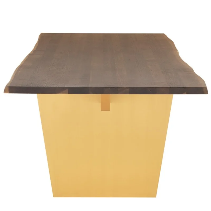Aiden dining table shown from long side where you can see the line of the Oak top and brushed gold base by Nuevo Living