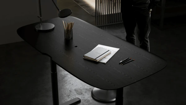 staged black desk product photo