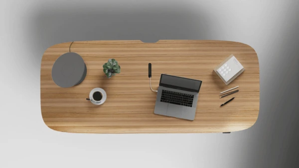 staged walnut desk product photo overhead shot