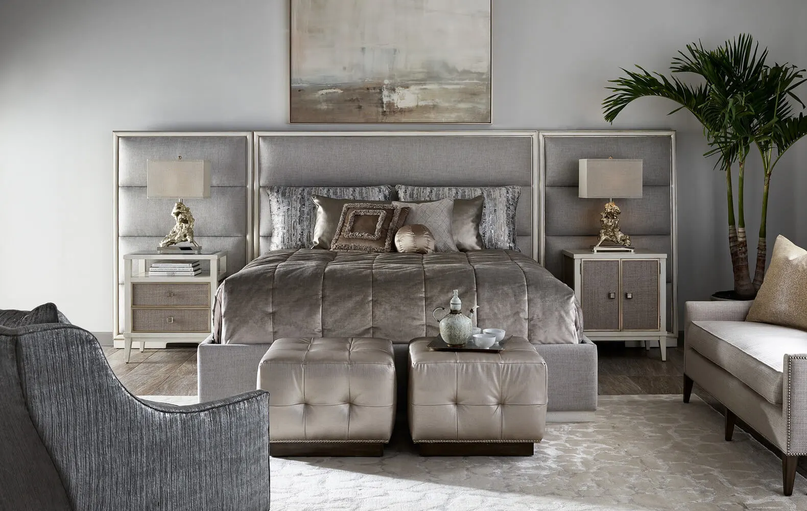paneled wing bed in a gray fabric with a silver finish wood trimming