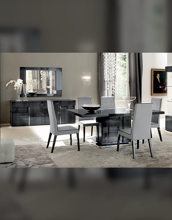 modern rectangular table with four light gray chairs showing table base
